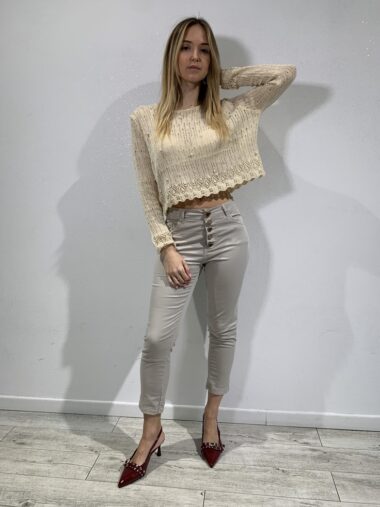 Pantalone con bottone a cuori
